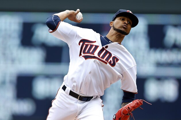 Minnesota Twins pitcher Ervin Santana throws against the Milwaukee Brewers in the first inning of a baseball game Tuesday, April 19, 2016, in Minneapolis. (AP Photo/Jim Mone)