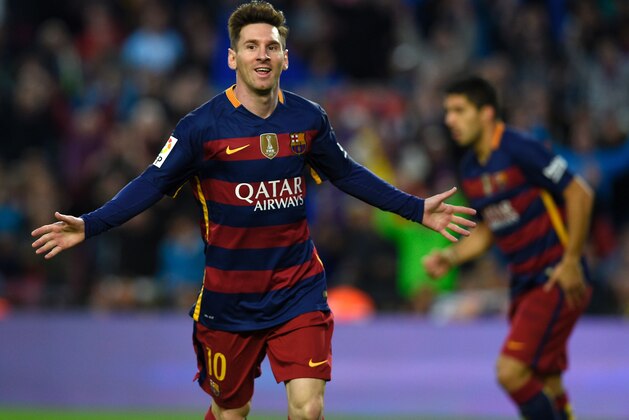 Barcelona's Argentinian forward Lionel Messi celebrates after scoring a goal during the Spanish league football match FC Barcelona vs Real Sporting de Gijï¿½ï¿½n at the Camp Nou stadium in Barcelona on April 23, 2016. / AFP / LLUIS GENE        (Photo credit should read LLUIS GENE/AFP/Getty Images)