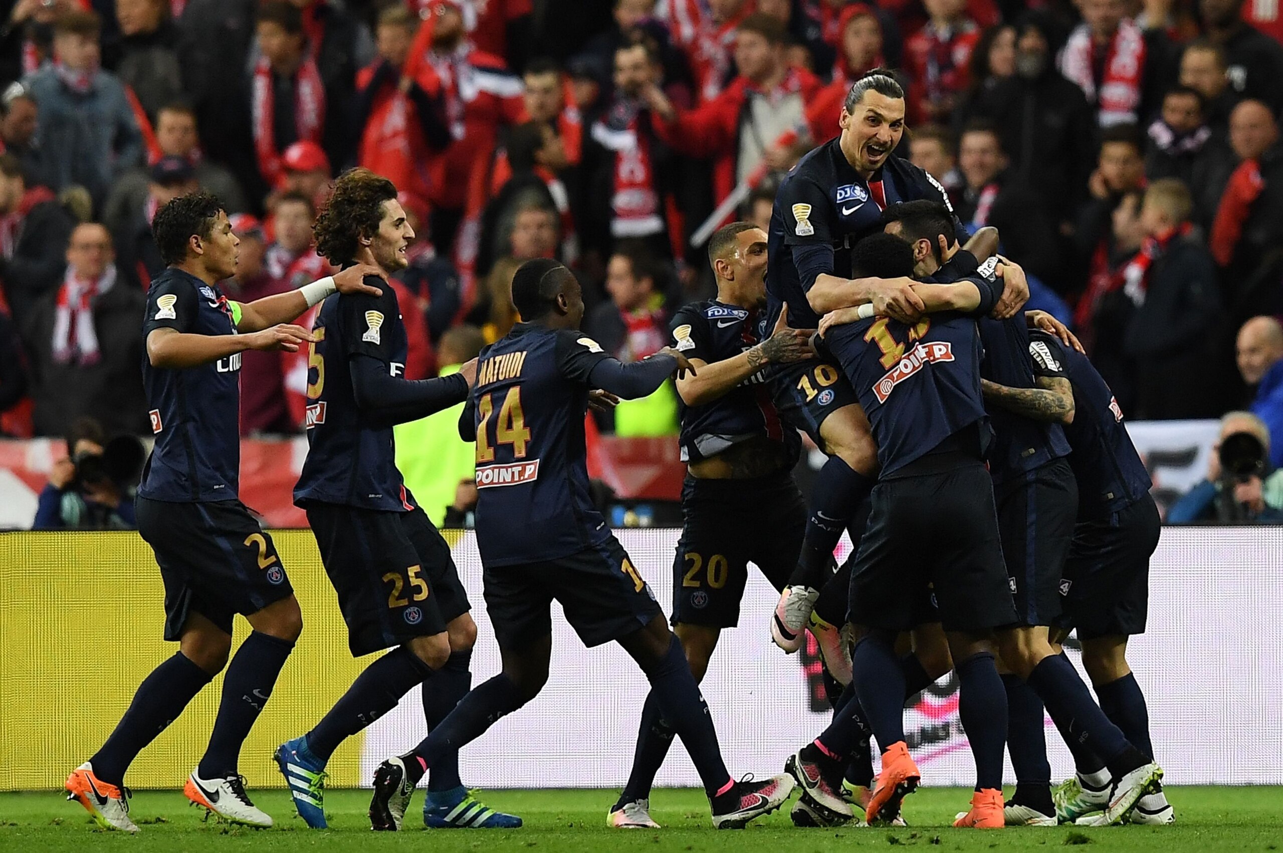 Paris Saint-Germain's Argentinian midfielder Javier Pastore  (2nd R) celebrates with teammates after scoring a goal during the French League Cup final football match between Paris Saint-Germain and Lille on April 23, 2016 at the Stade de France in Saint-Denis, north of Paris. AFP PHOTO / FRANCK FIFE / AFP / FRANCK FIFE        (Photo credit should read FRANCK FIFE/AFP/Getty Images)