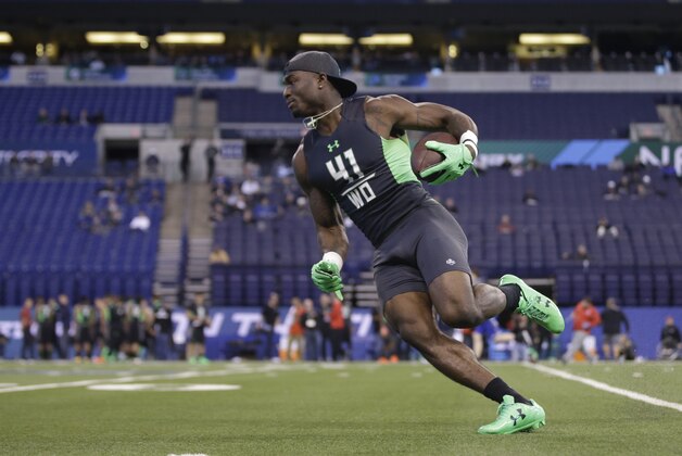 Mississippi receiver Laquon Treadwell runs a drill at the NFL football scouting combine on Saturday, Feb. 27, 2016, in Indianapolis. (AP Photo/Darron Cummings)