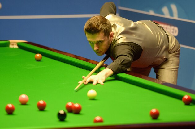 SHEFFIELD, ENGLAND - APRIL 19:  Mark Selby plays a shot against Robert Milkins during their first round match of the World Snooker Championship at Crucible Theatre on April 19, 2016 in Sheffield, England.  (Photo by Gareth Copley/Getty Images)