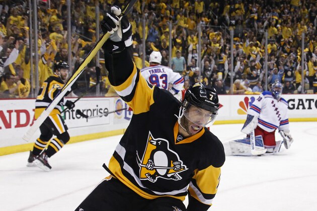 Pittsburgh Penguins' Matt Cullen (7) celibrates his goal during the second period of a first-round NHL playoff hockey game against the New York Rangers in Pittsburgh, Saturday, April 23, 2016. (AP Photo/Gene J. Puskar)