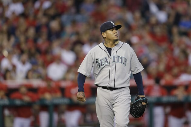 Seattle Mariners starting pitcher Felix Hernandez walks off the field after the bottom of the fourth inning of a baseball game against the Los Angeles Angels, Saturday, April 23, 2016, in Anaheim, Calif. (AP Photo/Jae C. Hong)