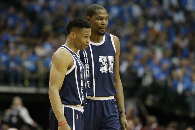 Oklahoma City Thunder forward Kevin Durant (35) and guard Russell Westbrook (0) chat during the second half in Game 4 of a first-round NBA basketball playoff against the Dallas Mavericks series Saturday, April 23, 2016, in Dallas. (AP Photo/LM Otero)
