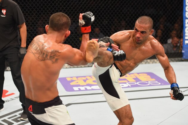 LAS VEGAS, NV - APRIL 23:  (R-L) Edson Barboza kicks Anthony Pettis in their lightweight bout during the UFC 197 event inside MGM Grand Garden Arena on April 23, 2016 in Las Vegas, Nevada.  (Photo by Josh Hedges/Zuffa LLC/Zuffa LLC via Getty Images)
