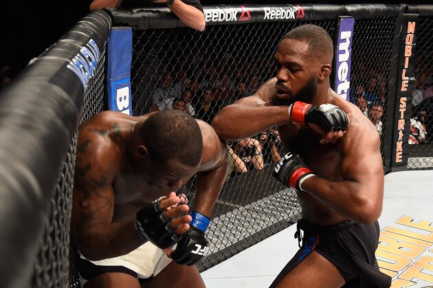 LAS VEGAS, NV - APRIL 23:  (R-L) Jon Jones elbows Ovince Saint Preux in their interim UFC light heavyweight championship bout during the UFC 197 event inside MGM Grand Garden Arena on April 23, 2016 in Las Vegas, Nevada.  (Photo by Josh Hedges/Zuffa LLC/Zuffa LLC via Getty Images)