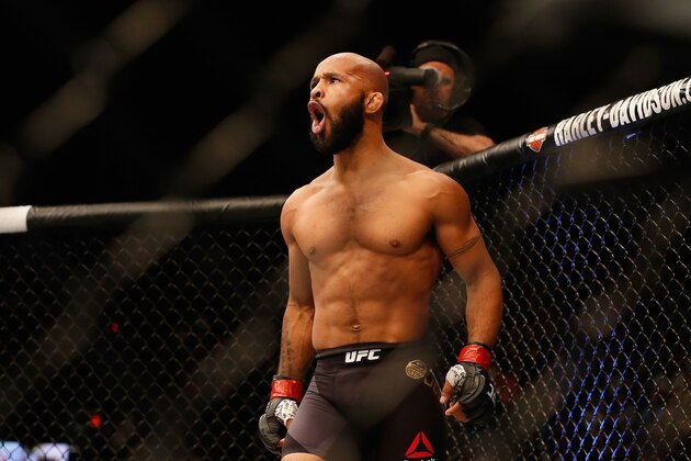 LAS VEGAS, NV - APRIL 23:  Demetrious Johnson celebrates his TKO victory over Henry Cejudo in their flyweight championship bout during the UFC 197 event inside MGM Grand Garden Arena on April 23, 2016 in Las Vegas, Nevada.  (Photo by Christian Petersen/Zuffa LLC/Zuffa LLC via Getty Images)