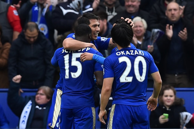 Leicester City's Argentinian striker Leonardo Ulloa (C) celebrates scoring his second and Leicester's third goal during the English Premier League football match between Leicester City and Swansea at King Power Stadium in Leicester, central England on April 24, 2016. / AFP / BEN STANSALL / RESTRICTED TO EDITORIAL USE. No use with unauthorized audio, video, data, fixture lists, club/league logos or 'live' services. Online in-match use limited to 75 images, no video emulation. No use in betting, games or single club/league/player publications.  /         (Photo credit should read BEN STANSALL/AFP/Getty Images)