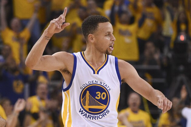 April 16, 2016; Oakland, CA, USA; Golden State Warriors guard Stephen Curry (30) celebrates after making a three-point basket against the Houston Rockets during the first quarter in game one of the first round of the NBA Playoffs at Oracle Arena. Mandatory Credit: Kyle Terada-USA TODAY Sports