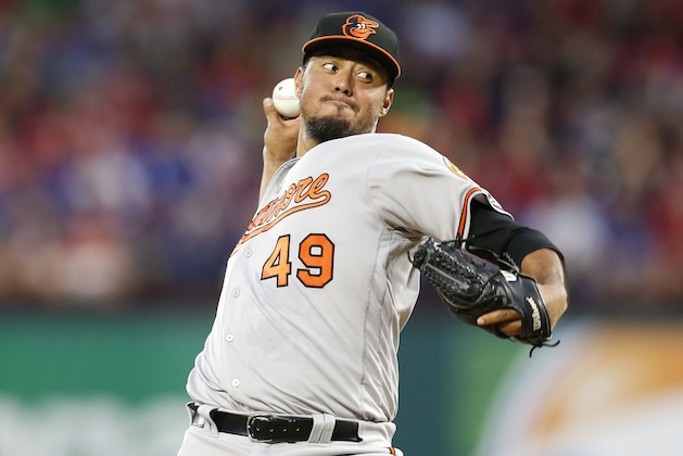 Baltimore Orioles starting pitcher Yovani Gallardo delivers to the Texas Rangers during the first inning of a baseball game, Saturday, April 16, 2016, in Arlington, Texas. (AP Photo/Jim Cowsert)