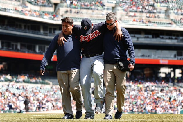 Cleveland Indians pitcher Carlos Carrasco is helped off the field in the third inning of a baseball game against the Detroit Tigers, Sunday, April 24, 2016, in Detroit. (AP Photo/Paul Sancya)