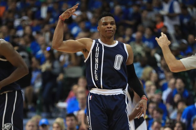 DALLAS, TX - APRIL 23:  Russell Westbrook #0 of the Oklahoma City Thunder celebrates a three-point shot against the Dallas Mavericks during game four of the Western Conference Quarterfinals of the 2016 NBA Playoffs at American Airlines Center on April 23, 2016 in Dallas, Texas. NOTE TO USER: User expressly acknowledges and agrees that, by downloading and or using this photograph, User is consenting to the terms and conditions of the Getty Images License Agreement.  (Photo by Ronald Martinez/Getty Images)