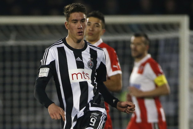 BELGRADE, SERBIA - FEBRUARY 27 : Dusan Vlahovic (C) of FK Partizan in action during the Serbian Super League match between FK Partizan and FK Crvena Zvezda at Stadium FK Partizan on February 27, 2016 in Belgrade, Serbia.  (Photo by Srdjan Stevanovic/Getty Images)