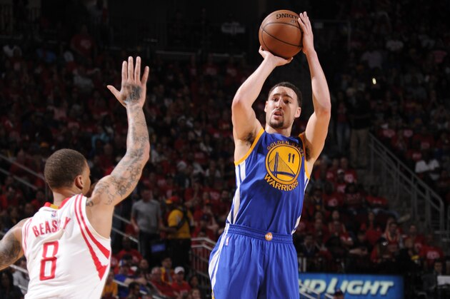 HOUSTON, TX - APRIL 24:  Klay Thompson #11 of the Golden State Warriors shoots the ball against the Houston Rockets in Game Four of the Western Conference Quarterfinals during the 2016 NBA Playoffs on April 24, 2016 at the Toyota Center in Houston, Texas. NOTE TO USER: User expressly acknowledges and agrees that, by downloading and or using this photograph, User is consenting to the terms and conditions of the Getty Images License Agreement. Mandatory Copyright Notice: Copyright 2016 NBAE (Photo by Bill Baptist/NBAE via Getty Images)