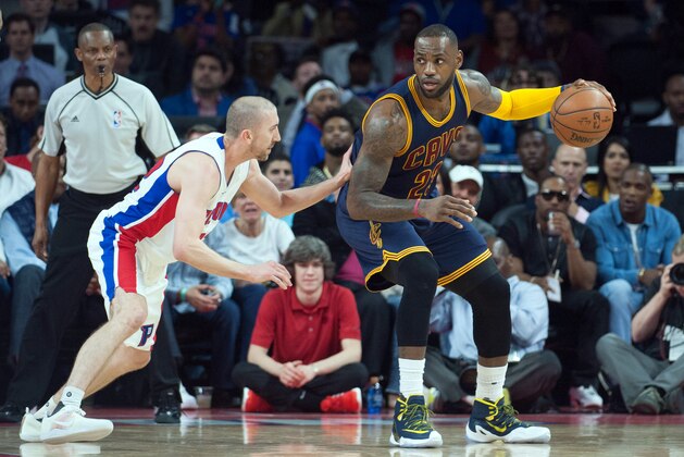 Apr 22, 2016; Auburn Hills, MI, USA; Cleveland Cavaliers forward LeBron James (23) backs down Detroit Pistons guard Steve Blake (22) during the fourth quarter in game three of the first round of the NBA Playoffs at The Palace of Auburn Hills. Mandatory Credit: Tim Fuller-USA TODAY Sports