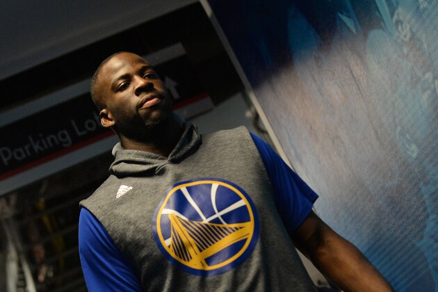 OAKLAND, CA - APRIL 18: Draymond Green #23 of the Golden State Warriors gets ready before the game against the Houston Rockets in Game Two of the Western Conference Quarterfinals during the 2016 NBA Playoffs on April 18, 2016 at ORACLE Arena in Oakland, California. NOTE TO USER: User expressly acknowledges and agrees that, by downloading and or using this photograph, user is consenting to the terms and conditions of Getty Images License Agreement. Mandatory Copyright Notice: Copyright 2016 NBAE (Photo by Noah Graham/NBAE via Getty Images)