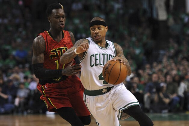 Apr 24, 2016; Boston, MA, USA; Boston Celtics guard Isaiah Thomas (4) controls the ball past Atlanta Hawks guard Dennis Schroder (17) during the first half in game four of the first round of the NBA Playoffs at TD Garden. Mandatory Credit: Bob DeChiara-USA TODAY Sports