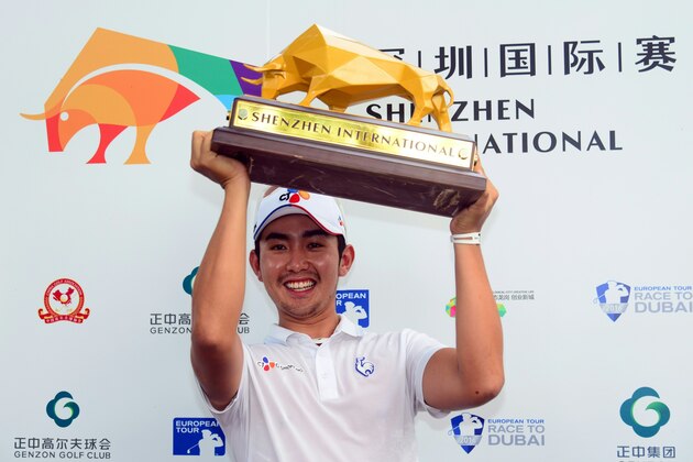 Soomin Lee of South Korea poses with the trophy after winning the Shenzhen International golf tournament at Genzon Golf Club in Shenzhen, southern China's Guangdong province on April 25, 2016. / AFP / STR / China OUT        (Photo credit should read STR/AFP/Getty Images)