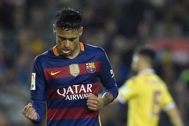 Barcelona's Brazilian forward Neymar celebrates after scoring during the Spanish league football match FC Barcelona vs Real Sporting de Gijï¿½ï¿½ï¿½ï¿½ï¿½ï¿½n at the Camp Nou stadium in Barcelona on April 23, 2016. / AFP / LLUIS GENE        (Photo credit should read LLUIS GENE/AFP/Getty Images)