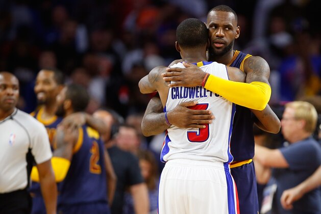 AUBURN HILLS, MI - APRIL 24: Kentavious Caldwell-Pope #5 of the Detroit Pistons gets a hug from LeBron James #23 of the Cleveland Cavaliers after a 100-98 loss in game four of the NBA Eastern Conference quarterfinals during the 2016 NBA Playoffs at the Palace of Auburn Hills on April 24, 2016 in Auburn Hills, Michigan. NOTE TO USER: User expressly acknowledges and agrees that, by downloading and or using this photograph, User is consenting to the terms and conditions of the Getty Images License Agreement.  (Photo by Gregory Shamus/Getty Images)