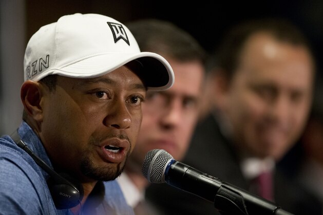 Tiger Woods responds to a question during a press conference to launch the Bridgestone America's Golf Cup in Mexico City, Tuesday, Oct. 20, 2015. Woods withdrew from the Bridgestone America's Golf Cup and two other events he had planned to play this year following back surgery. He isn't expected to return to the tour until January at the earliest. (AP Photo/Rebecca Blackwell)