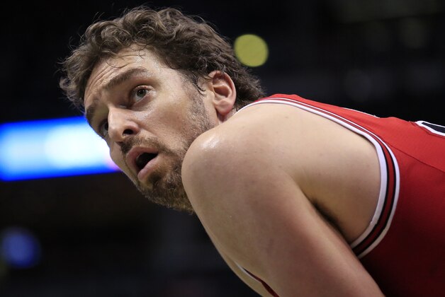 Chicago Bulls center Pau Gasol looks up as the Milwaukee Bucks take a free throw during the second half of an NBA basketball game Sunday, April 3, 2016, in Milwaukee. (AP Photo/Darren Hauck)