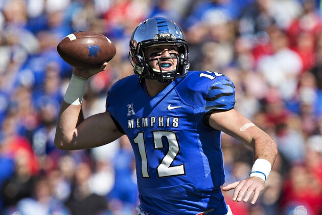 MEMPHIS, TN - OCTOBER 17:  Paxton Lynch #12 of the Memphis Tigers rolls out to pass during a game against the Ole Miss Rebels at Liberty Bowl Memorial Stadium on October 17, 2015 in Memphis, Tennessee.  The Tigers defeated the Rebels 37-24.  (Photo by Wesley Hitt/Getty Images)