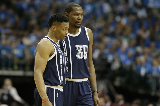 Oklahoma City Thunder forward Kevin Durant (35) and guard Russell Westbrook (0) chat during the second half in Game 4 of a first-round NBA basketball playoff against the Dallas Mavericks series Saturday, April 23, 2016, in Dallas. (AP Photo/LM Otero)