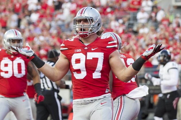 Sep 27, 2014; Columbus, OH, USA; Ohio State Buckeyes defensive lineman Joey Bosa (97) celebrates after forcing a turnover that led to a safety by the Cincinnati Bearcats at Ohio Stadium. Mandatory Credit: Greg Bartram-USA TODAY Sports