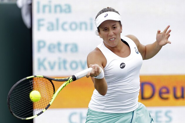 Irina Falconi returns to Petra Kvitova, of the Czech Republic, during a match at the Miami Open tennis tournament in Key Biscayne, Fla., Thursday, March 24, 2016. (AP Photo/Alan Diaz)