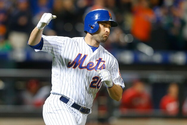 NEW YORK, NY - APRIL 25:  Neil Walker #20 of the New York Mets reacts after his seventh inning two run home run against the Cincinnati Reds at Citi Field on April 25, 2016 in the Flushing neighborhood of the Queens borough of New York City.  (Photo by Jim McIsaac/Getty Images)