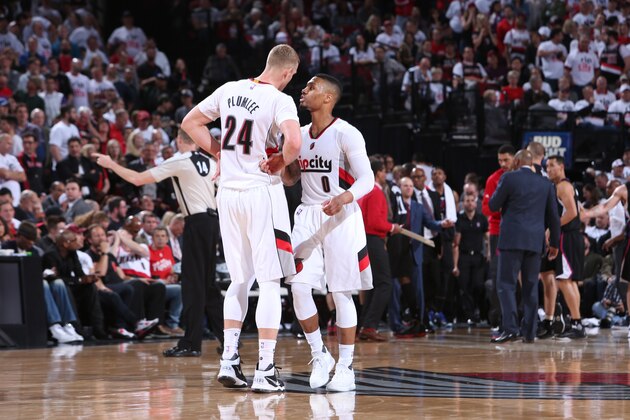 PORTLAND, OR - APRIL 25:  Mason Plumlee #24 of the Portland Trail Blazers talks with Damian Lillard #0 of the Portland Trail Blazers against the Los Angeles Clippers in Game Four of the Western Conference Quarterfinals during the 2016 NBA Playoffs on April 25, 2016 at the Moda Center in Portland, Oregon. NOTE TO USER: User expressly acknowledges and agrees that, by downloading and or using this Photograph, user is consenting to the terms and conditions of the Getty Images License Agreement. Mandatory Copyright Notice: Copyright 2016 NBAE (Photo by Sam Forencich/NBAE via Getty Images)