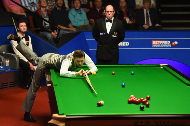 SHEFFIELD, ENGLAND - APRIL 26: Mark Selby of England in action during his quarter final match against Kyren Wilson of England on day eleven of the World Championship Snooker at Crucible Theatre on April 26, 2016 in Sheffield, England.  (Photo by Laurence Griffiths/Getty Images)