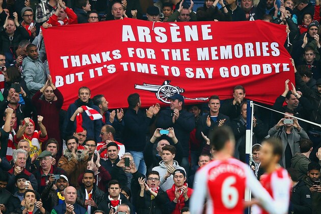 WEST BROMWICH, ENGLAND - NOVEMBER 29: (EDITORS NOTE: This is a retransmission of image #459708260 with an alternative crop) Arsenal fans hold up a banner for Arsene Wenger, manager of Arsenal during the Barclays Premier League match between West Bromwich Albion and Arsenal at The Hawthorns on November 29, 2014 in West Bromwich, England (Photo by Mark Thompson/Getty Images) WEST BROMWICH, ENGLAND - NOVEMBER 29: (EDITORS NOTE: This is a retransmission of image #459708260 with an alternative crop) Arsenal fans hold up a banner for Arsene Wenger, manager of Arsenal during the Barclays Premier League match between West Bromwich Albion and Arsenal at The Hawthorns on November 29, 2014 in West Bromwich, England (Photo by Mark Thompson/Getty Images)