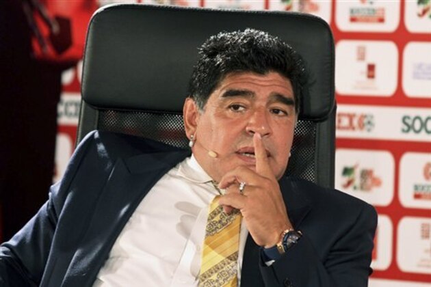FILE - In this May 4, 2015 file photo, Argentina football legend Diego Maradona speaks on the second day of the SoccerEx Asian Forum conference in Southern Shuneh, Jordan. Journalist Victor Hugo Morales said on Twitter late Sunday, June 21, 2015 that Maradona plans to run for president of FIFA. (AP Photo/Raad Adayleh, File)