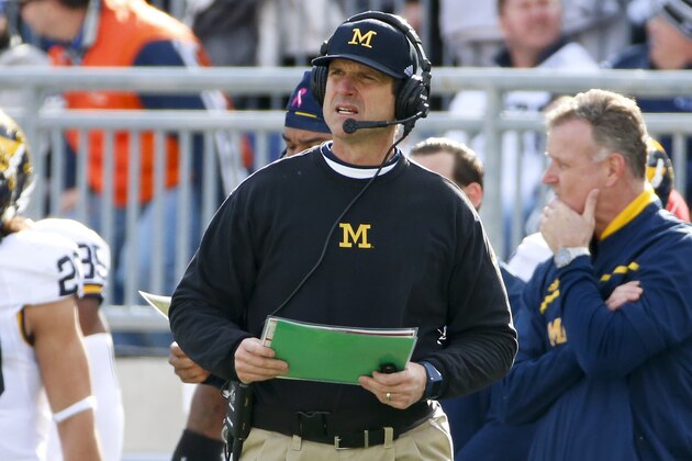 Michigan head coach Jim Harbaugh stands on the sidelines during an NCAA college football game against Penn State in State College, Pa., Saturday, Nov. 21, 2015. (AP Photo/Gene J. Puskar)