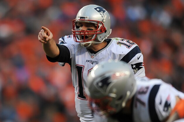 DENVER, CO - JANUARY 24:  Tom Brady #12 of the New England Patriots runs the offense against the Denver Broncos  in the AFC Championship game at Sports Authority Field at Mile High on January 24, 2016 in Denver, Colorado.  (Photo by Dustin Bradford/Getty Images)