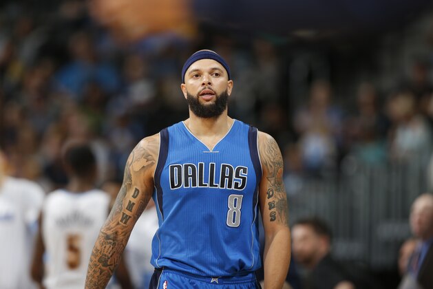 Dallas Mavericks guard Deron Williams (8) in second half of an NBA basketball game Sunday, March 6, 2016, in Denver. The Nuggets won 116-114 in overtime. (AP Photo/David Zalubowski)