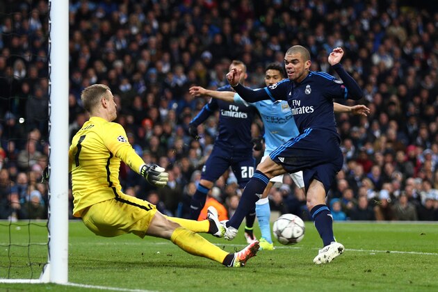 MANCHESTER, ENGLAND - APRIL 26: Goalkeeper Joe Hart of Manchester City saves the point blank shot from Pepe of Real Madrid CF during the UEFA Champions League Semi Final first leg match between Manchester City FC and Real Madrid at the Etihad Stadium on April 26, 2016 in Manchester, United Kingdom. (Photo by Paul Gilham/Getty Images)