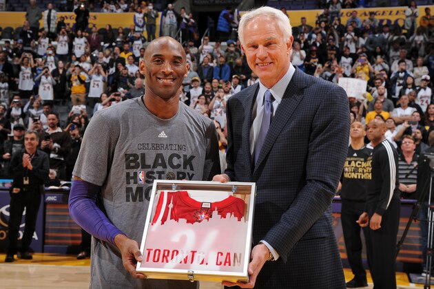 LOS ANGELES, CA - FEBRUARY 2:  Los Angeles Lakers General Manager Mitch Kupchak presents Kobe Bryant #24 of the Los Angeles Lakers with his 2016 NBA All-Star Jersey before the game against the Minnesota Timberwolves on February 2, 2016 at STAPLES Center in Los Angeles, California. NOTE TO USER: User expressly acknowledges and agrees that, by downloading and/or using this Photograph, user is consenting to the terms and conditions of the Getty Images License Agreement. Mandatory Copyright Notice: Copyright 2016 NBAE (Photo by Andrew D. Bernstein/NBAE via Getty Images)