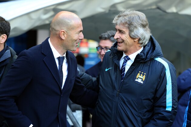 MANCHESTER, ENGLAND - APRIL 26: Zinedine Zidane the head coach / manager of Real Madrid is greeted by Manuel Pellegrini the head coach / manager of Manchester City before the UEFA Champions League Semi Final first leg match between Manchester City FC and Real Madrid at the Etihad Stadium on April 26, 2016 in Manchester, United Kingdom. (Photo by Matthew Ashton - AMA/Getty Images)