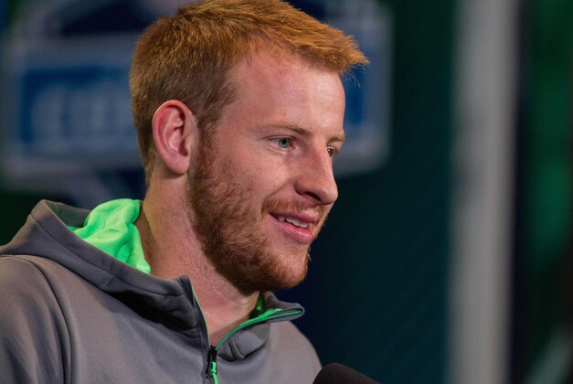 Feb 25, 2016; Indianapolis, IN, USA; North Dakota State quarterback Carson Wentz speaks to the media during the 2016 NFL Scouting Combine at Lucas Oil Stadium. Mandatory Credit: Trevor Ruszkowski-USA TODAY Sports