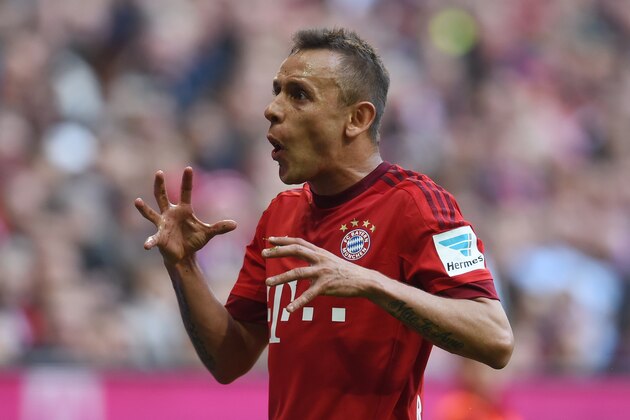 Bayern Munich's Brazilian defender Rafinha gestures during the German first division Bundesliga football match FC Bayern Munich vs Schalke 04 in Munich, southern Germany, on April 16, 2016.
Bayern Munich won the match 3-0. / AFP / CHRISTOF STACHE / RESTRICTIONS: DURING MATCH TIME: DFL RULES TO LIMIT THE ONLINE USAGE TO 15 PICTURES PER MATCH AND FORBID IMAGE SEQUENCES TO SIMULATE VIDEO. == RESTRICTED TO EDITORIAL USE == FOR FURTHER QUERIES PLEASE CONTACT DFL DIRECTLY AT + 49 69 650050
        (Photo credit should read CHRISTOF STACHE/AFP/Getty Images)