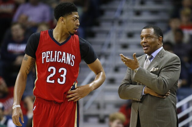 New Orleans Pelicans head coach Alvin Gentry and forward Anthony Davis (23) talk during the second half of an NBA basketball game against the Portland Trail Blazers Wednesday, Dec. 23, 2015, in New Orleans. The Pelicans won 115-89. (AP Photo/Jonathan Bachman)