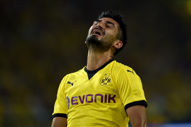 Dortmund's midfielder Ilkay Guendogan reacts during the UEFA Europa League third qualifying round second leg football match between  Borussia Dortmund and Wolfsberger AC on August 6, 2015 in Dortmund, western Germany. AFP PHOTO / PATRIK STOLLARZ        (Photo credit should read PATRIK STOLLARZ/AFP/Getty Images)