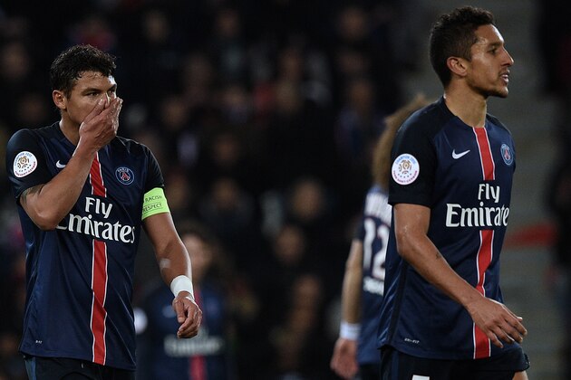 Paris Saint-Germain's Brazilian defenders Thiago Silva (L) and Marquinhos react after AS Monaco scored a goal during the French L1 football match between Paris Saint-Germain (PSG) and AS Monaco at the Parc des Princes stadium in Paris on March 20, 2016.  AFP PHOTO / FRANCK FIFE / AFP / FRANCK FIFE        (Photo credit should read FRANCK FIFE/AFP/Getty Images)