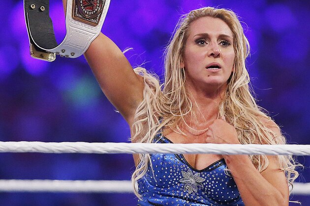 IMAGE DISTRIBUTED FOR WWE - WWE women's champion Charlotte celebrates her victory at WWE WrestleMania 32 at AT&T Stadium on Sunday, April 3, 2016, in Arlington, Texas. (Brandon Wade/AP Images for WWE)