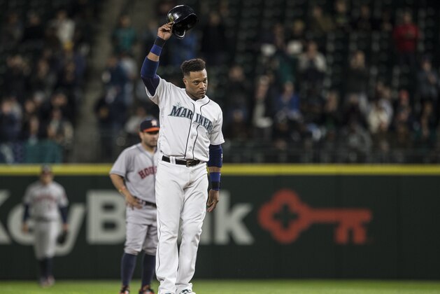 SEATTLE, WA - APRIL 26: Robinson Cano #22 of the Seattle Mariners acknowledges the crowd after hitting a RBI single, the 1,000th of his career, during the fifth inning of a game against the Houston Astros at Safeco Field on April 26, 2016 in Seattle, Washington. Cano reached second base on a throwing error (Photo by Stephen Brashear/Getty Images) SEATTLE, WA - APRIL 26: Robinson Cano #22 of the Seattle Mariners acknowledges the crowd after hitting a RBI single, the 1,000th of his career, during the fifth inning of a game against the Houston Astros at Safeco Field on April 26, 2016 in Seattle, Washington. Cano reached second base on a throwing error (Photo by Stephen Brashear/Getty Images)