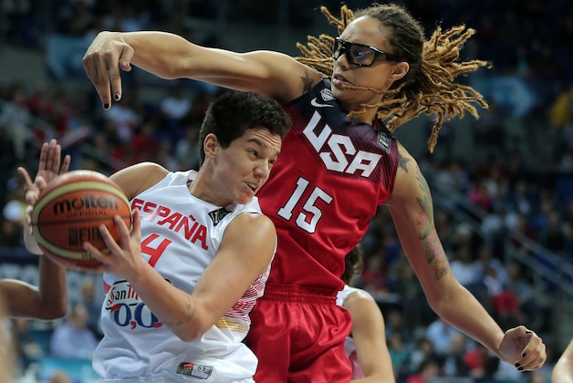 Laura Nicholls of Spain, left, and Brittney Griner of US fight for the ball during their Basketball Championship for Women's final at Fenerbahce Arena in Istanbul, Turkey, Sunday, Oct. 5, 2014.(AP Photo)