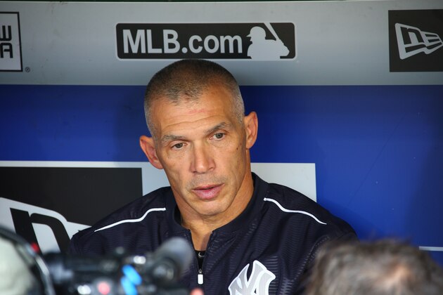ARLINGTON, TX - APRIL 26: Joe Girardi #28 manager of the New York Yankees is interviewed before the game against Texas Rangers at Global Life Park in Arlington on April 26, 2015 in Arlington, Texas. (Photo by Rick Yeatts/Getty Images)